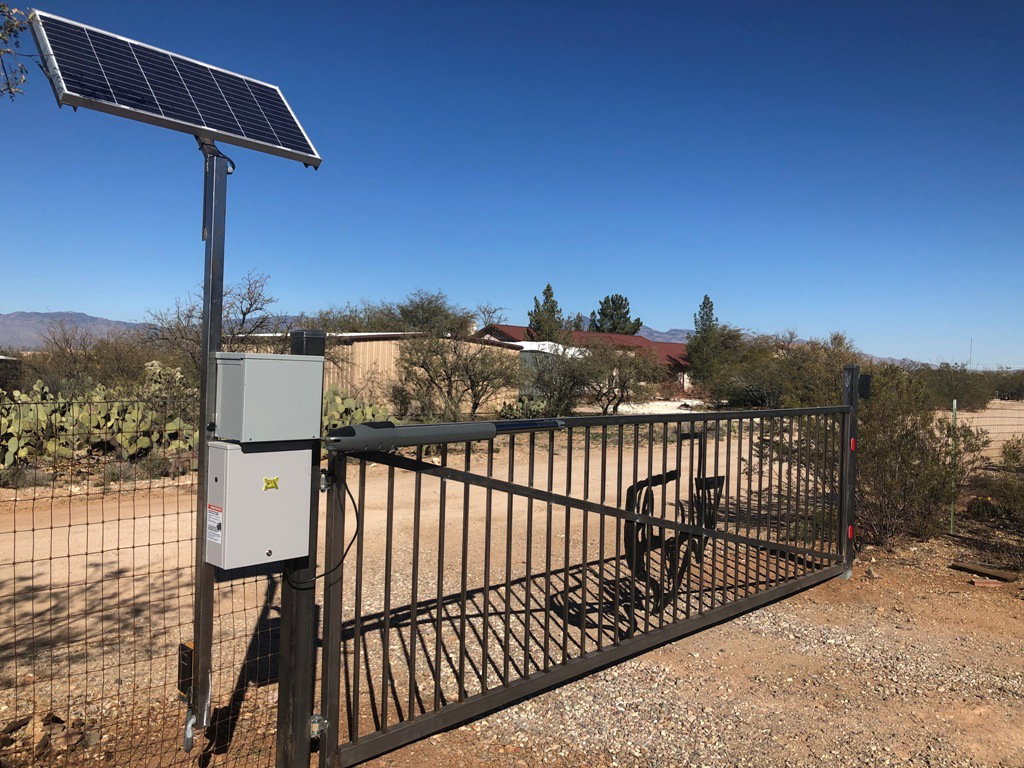 A tall automatic driveway gate installed and serviced across the Inland Empire