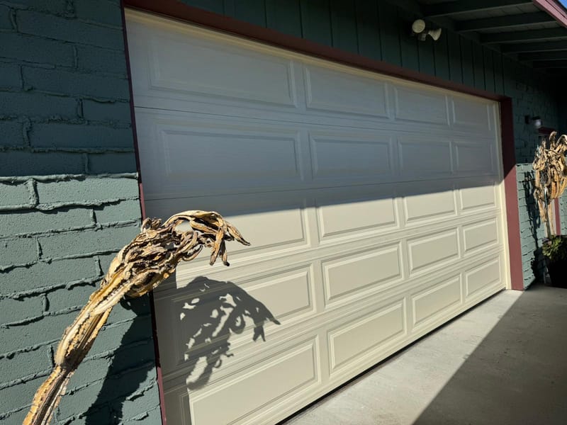 A garage door keypad with the backlight working again after a fix